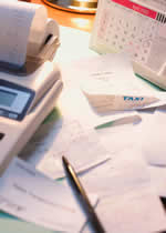 Calculator and paperwork